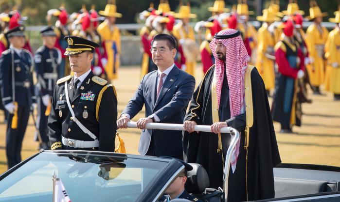 Defense Minister Kim Yong Hyun (left in back row) 