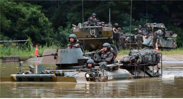Flowing like water Mechanized unit performs a perfect river crossing operation