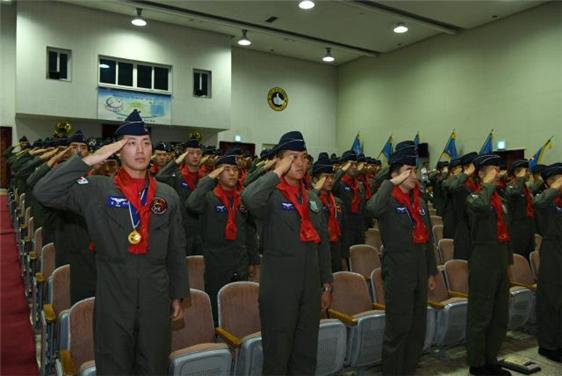 67 New members of the “red scarf” initiated